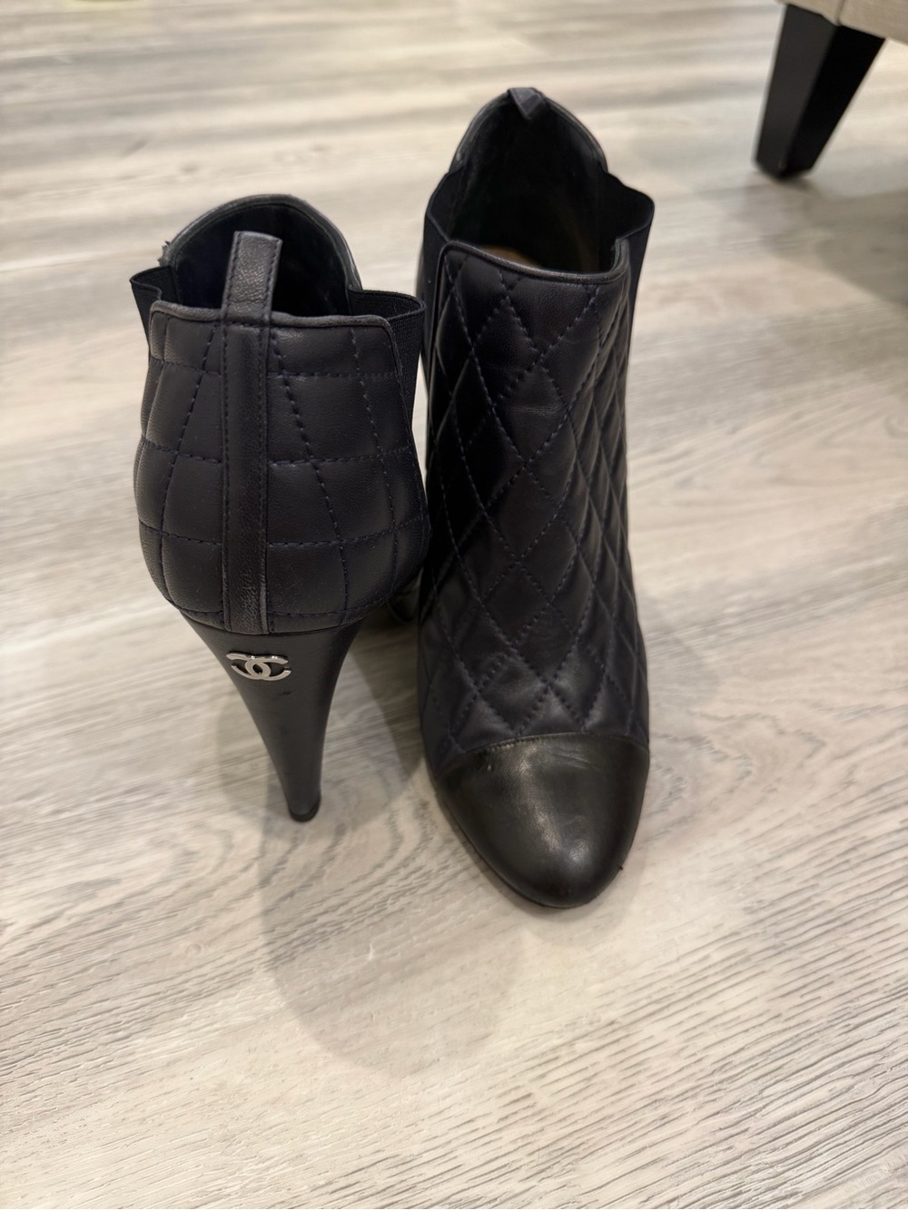 CHANEL Black Quilted Leather Pointed Toe Ankle Booties with CC Heel Accent